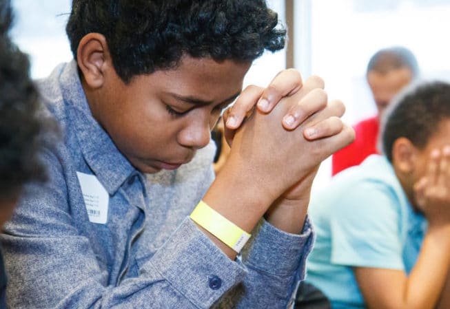 Boy praying