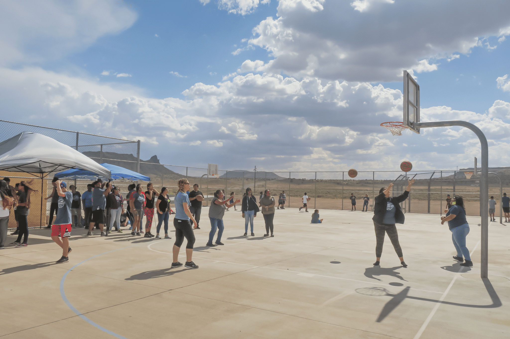 People playing basketball on the palyground