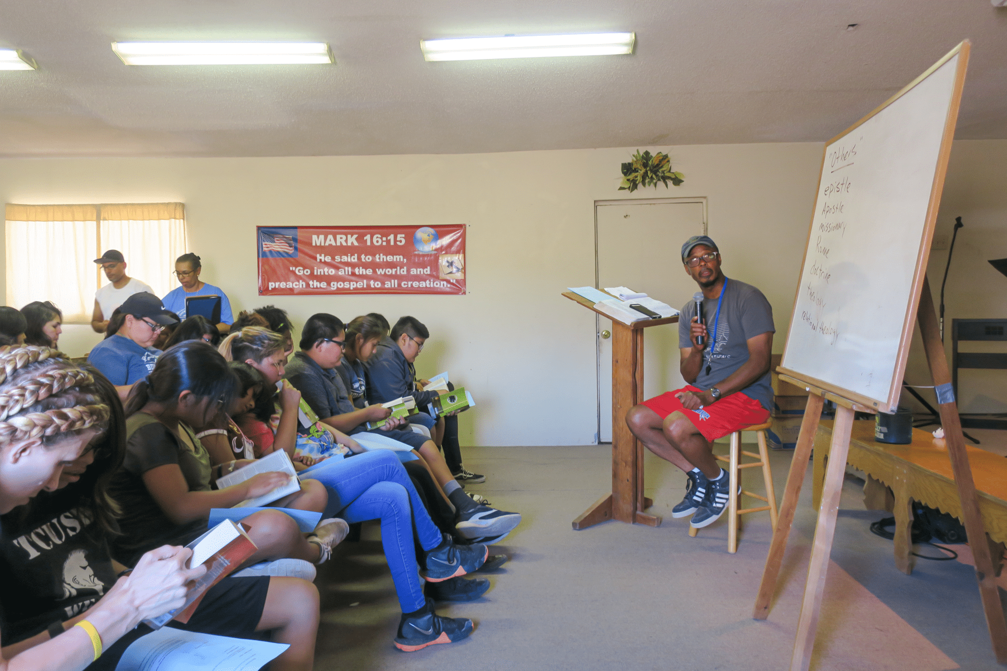 Pastor teaching youths in Navajo