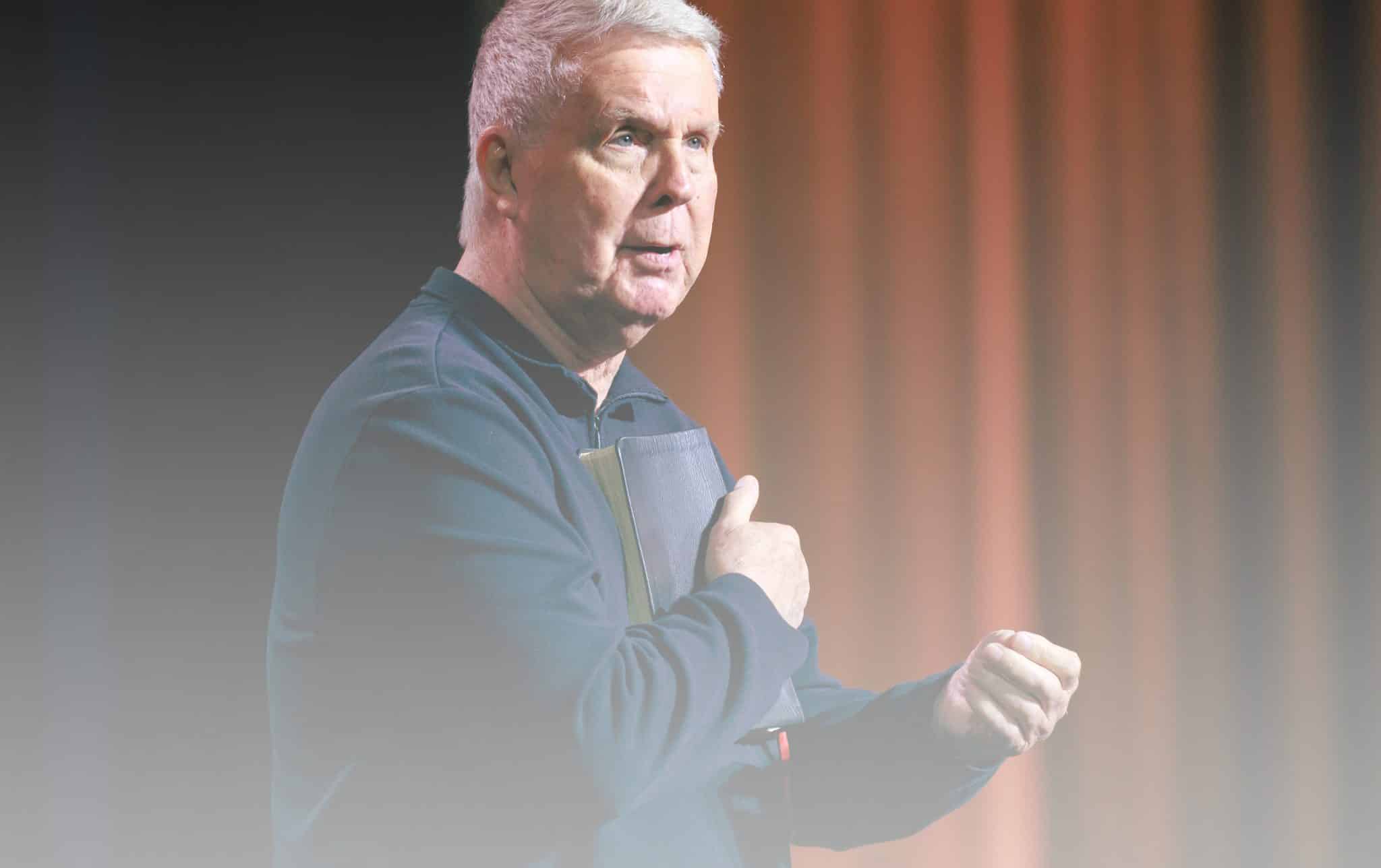 A pastor holding his Bible