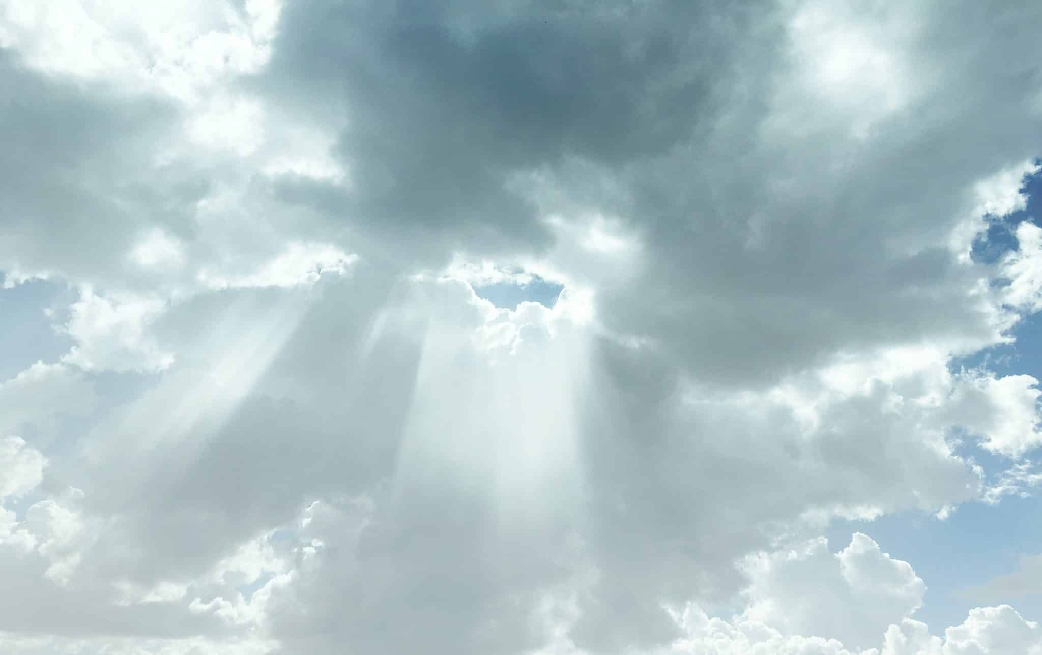 A beam of light breaking through the clouds.