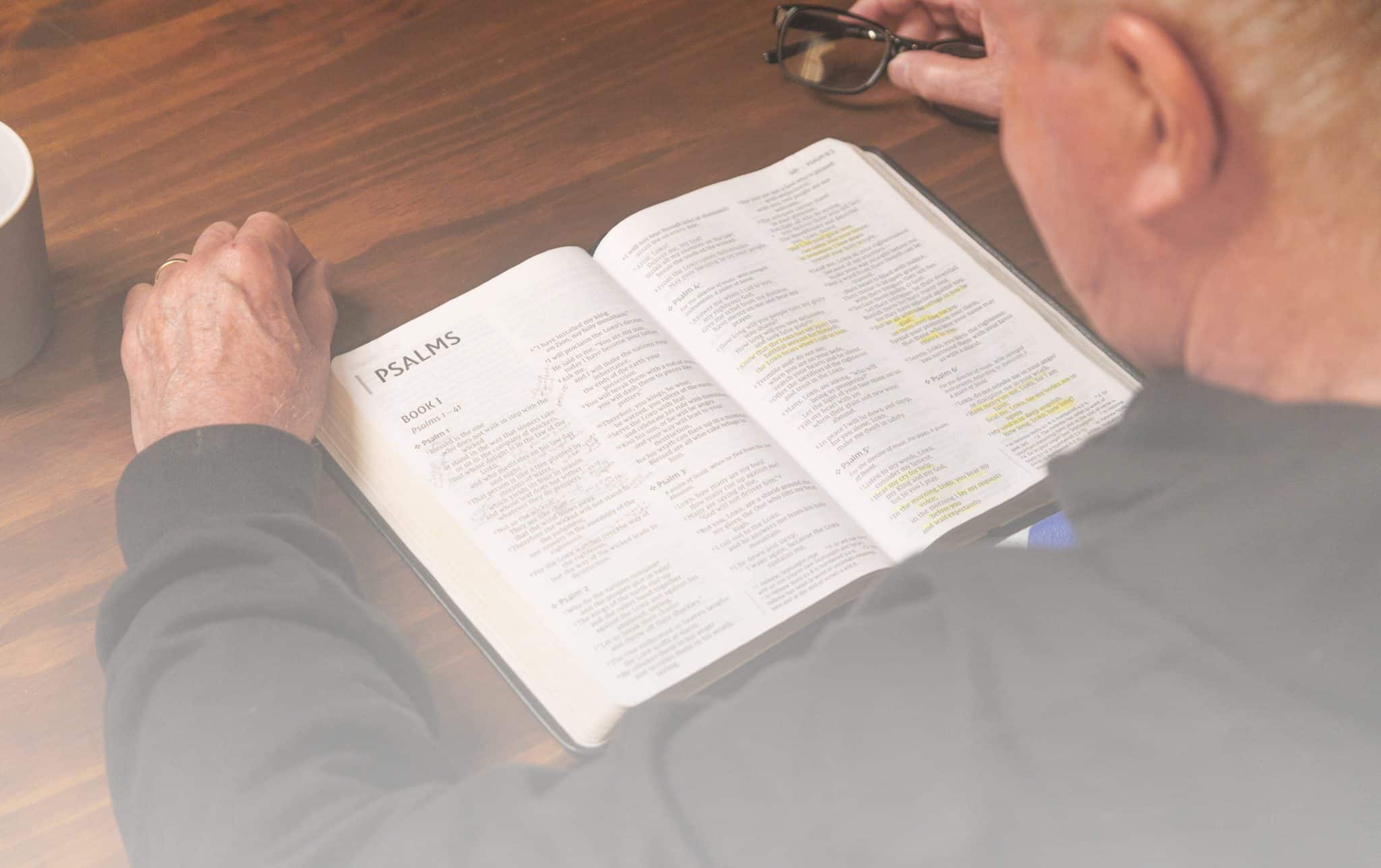 Pastor Jim Cymbala reading the book of Psalms from the Old Testament.